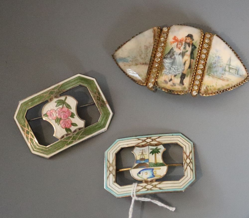 Two Bermuda sterling and enamel belt buckles, 5cm and a paste set gilt metal belt buckle.